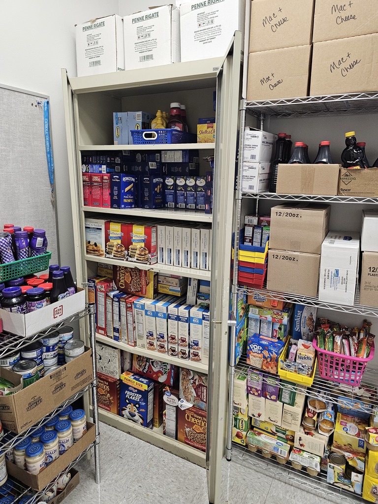 Image of a food pantry with shelves stocked with food