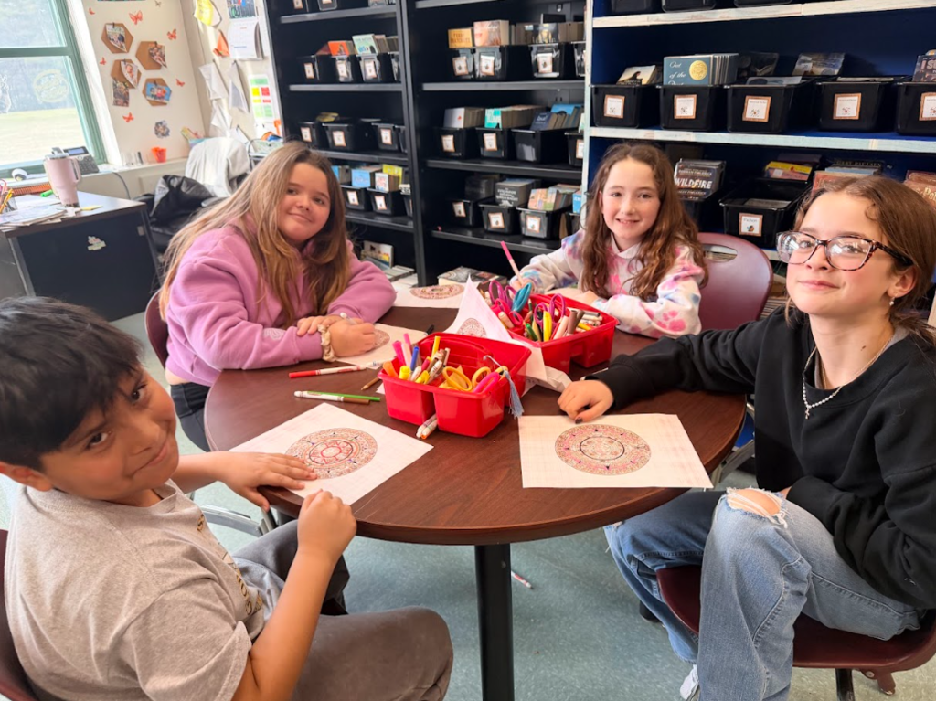 image of students coloring aztec calendars