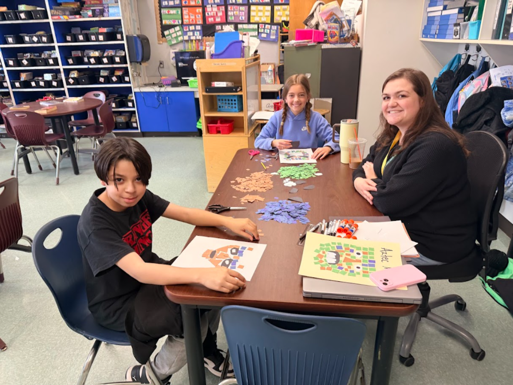 image of students making mosaic Aztec masks
