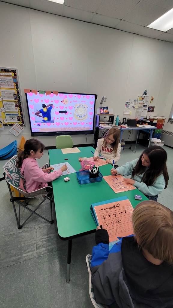 Students play winter themed literacy games