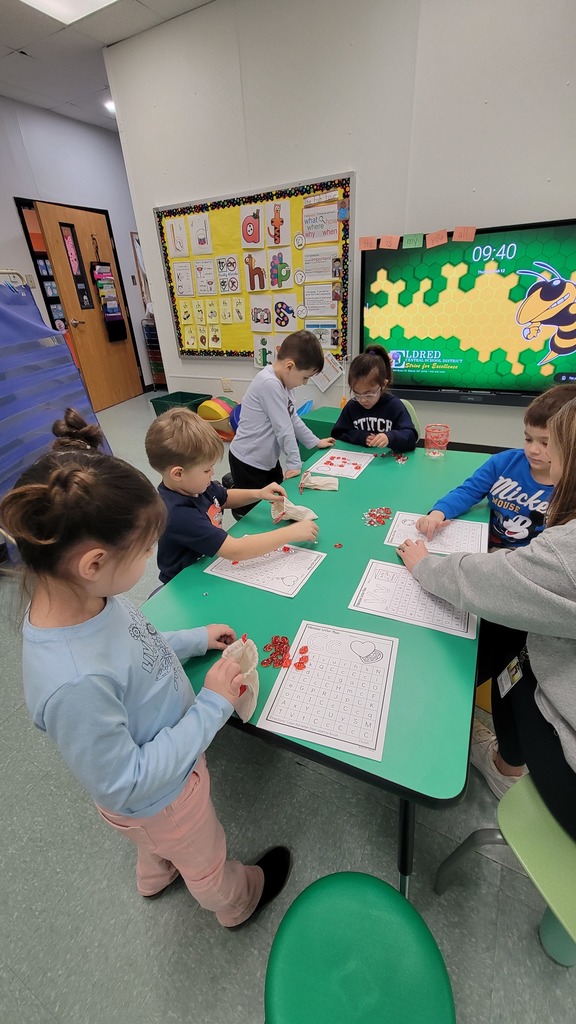 Students play winter themed literacy games