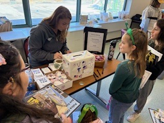 Students are show how the voting process works by a member of our local government 