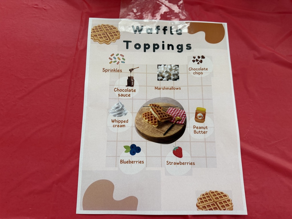 Image of the menu for the waffle toppings bar