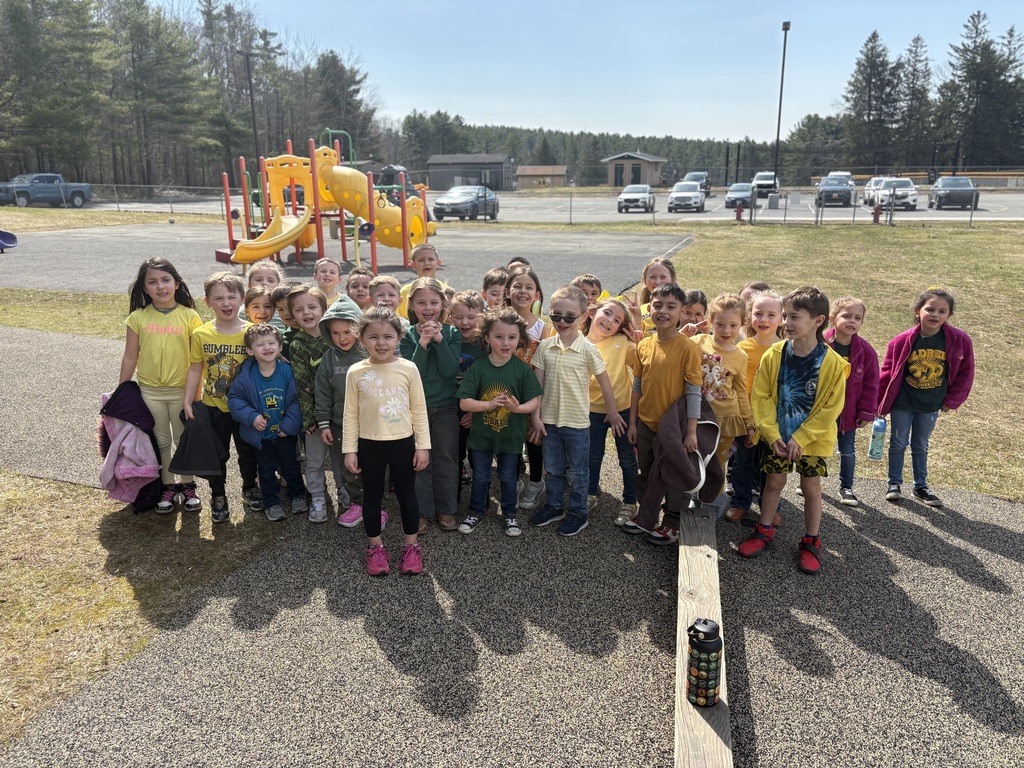 Image of PreK & K student wearing their yellow and green to celebrate color wars