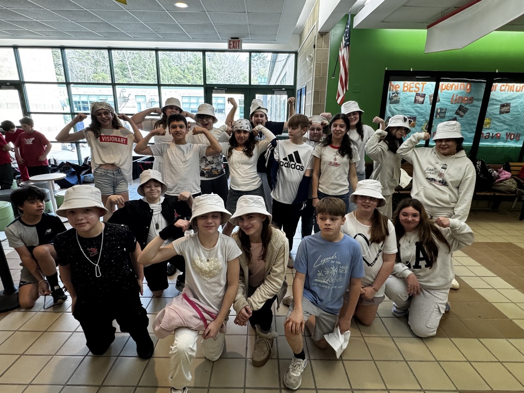 Image of a group of student wearing white to celebrate color wars