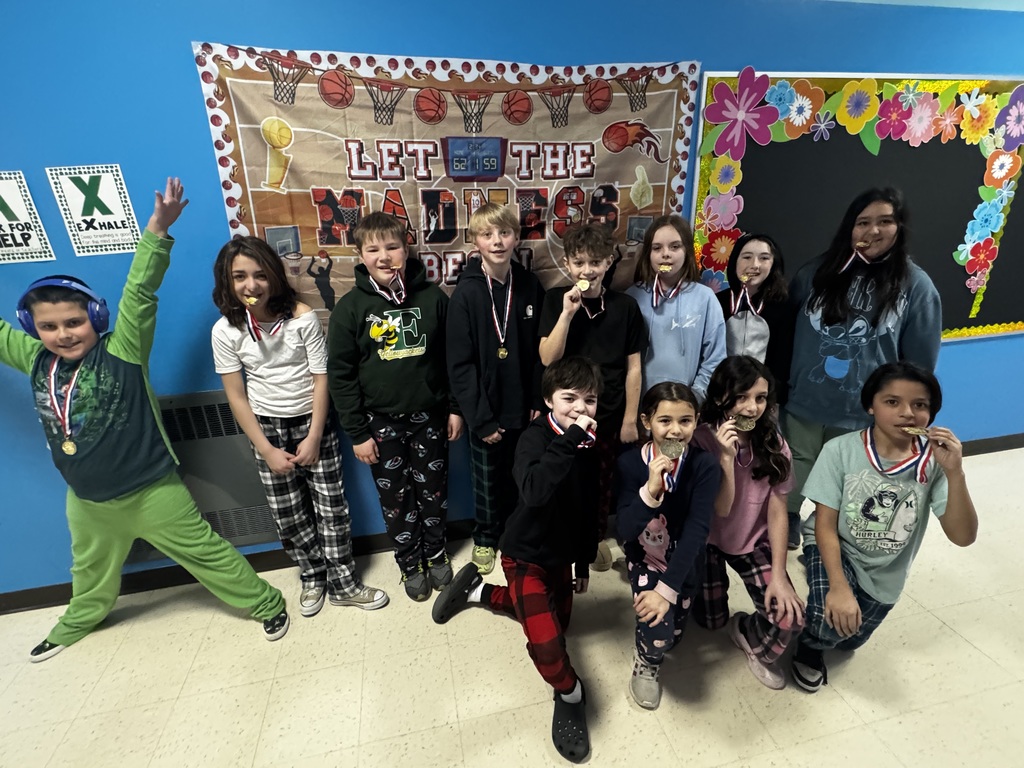 Image of one of the March Madness teams with their medals