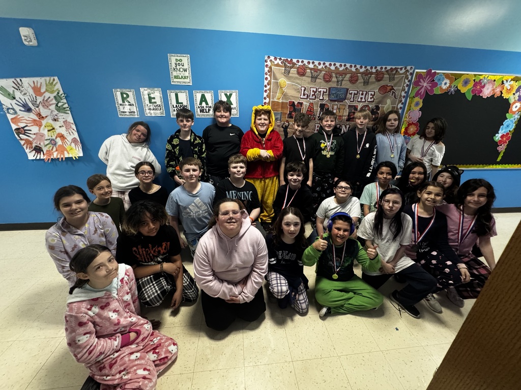 Image of one of the March Madness teams with their medals