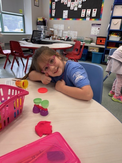 Image of a student posing with her egg stem activity