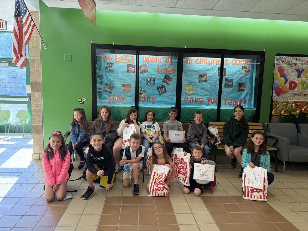 Student who logged more than 35 books in the Sullivan County Reading Challenge pose with their prize bags