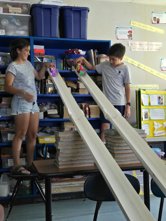 Image of students racing their egg car racer
