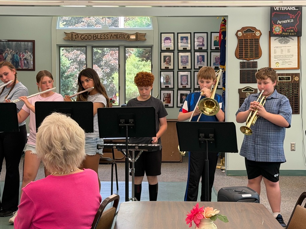 Image of students playing musical instruments