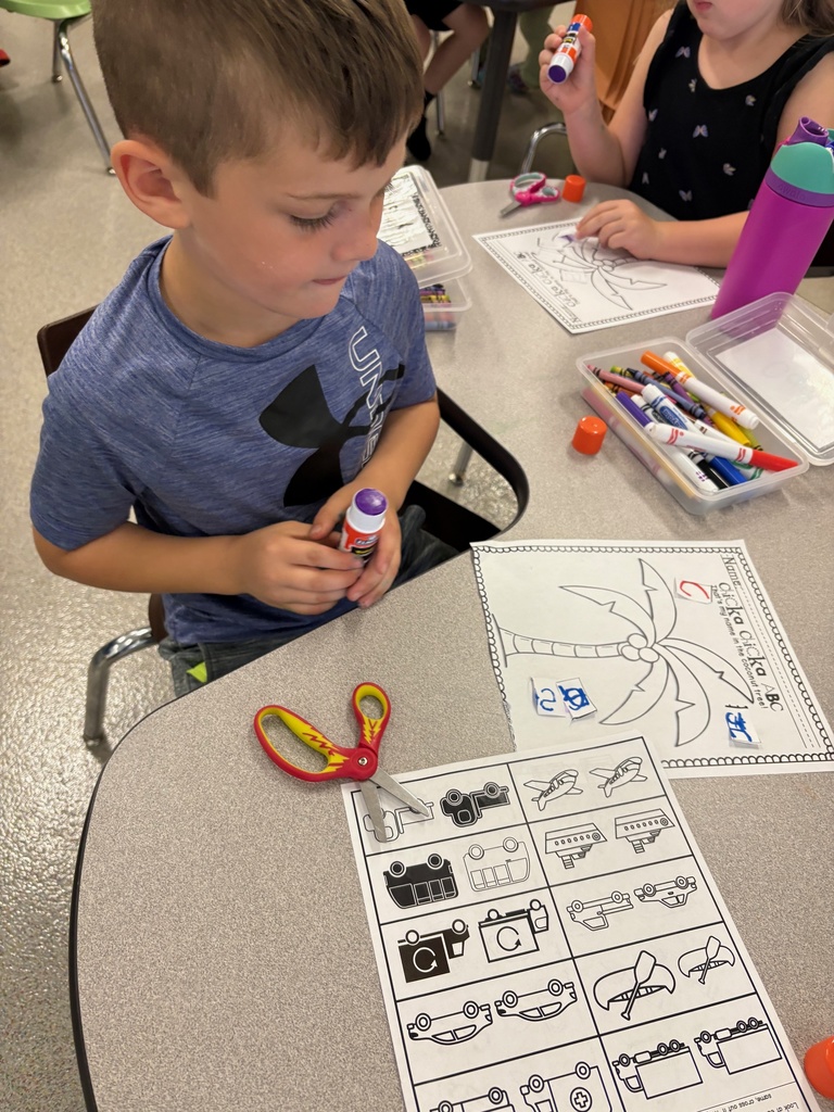 Diving into Chicka Chicka Boom Boom fun while working on names! 