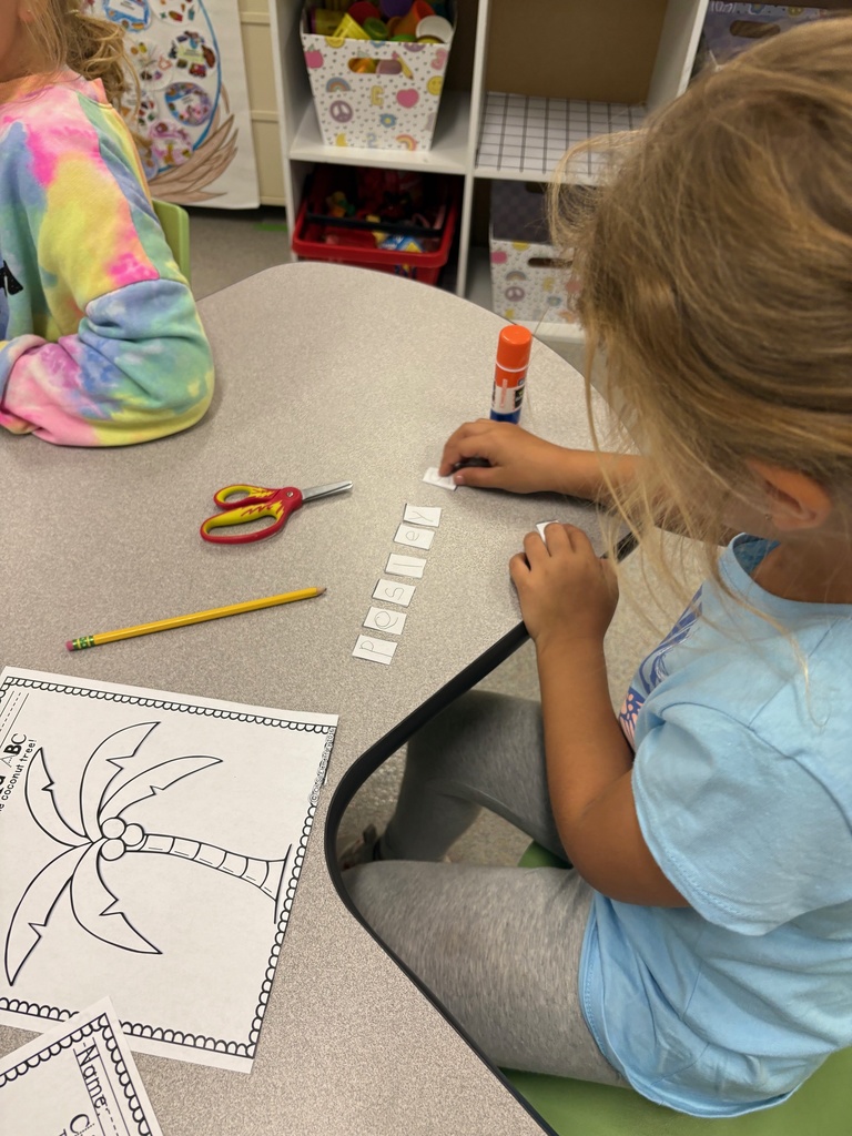 Diving into Chicka Chicka Boom Boom fun while working on names! 