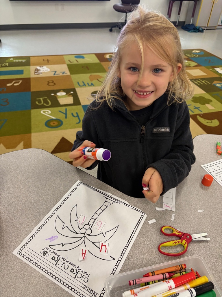 Diving into Chicka Chicka Boom Boom fun while working on names! 