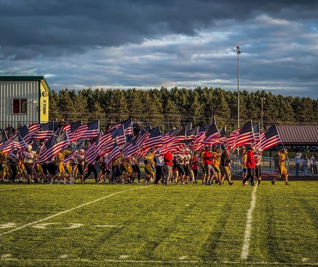 Last Friday night was about more than football. Players and coaches from Eleva-Strum Cardinal Football and Melrose-Mindoro came together to honor and pay tribute to our veterans and active military members.