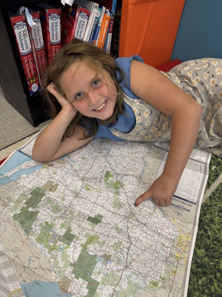 These young explorers are practicing their map skills.
