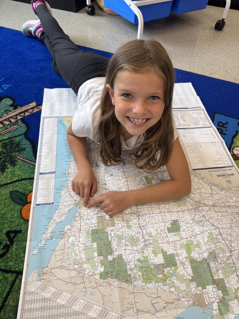 These young explorers are practicing their map skills.