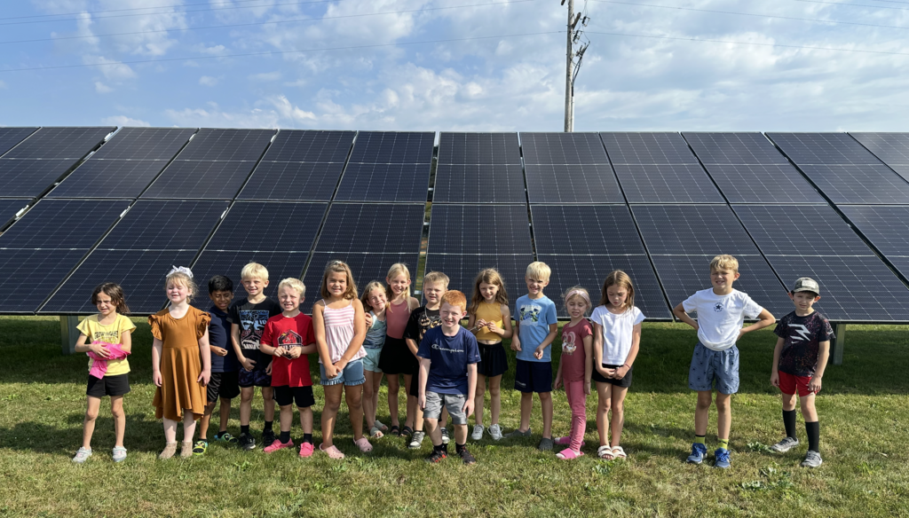 Mrs. Koxlien’s class is learning about schools around the world . As part of their studies, students explored how solar panels provide electricity to schools in Xixuau, Brazil
