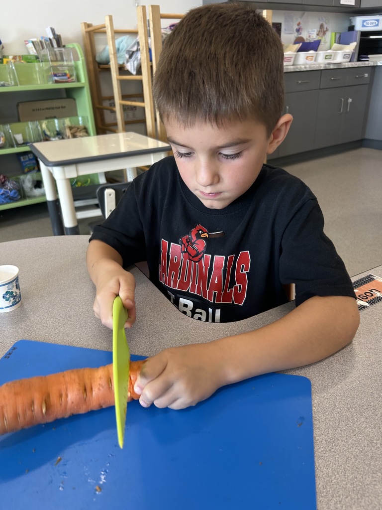 Kindergarten students had fun cleaning and chopping carrots, then tasted them two ways—dipped in ranch and baked into muffins they frosted themselves. Both were a hit!