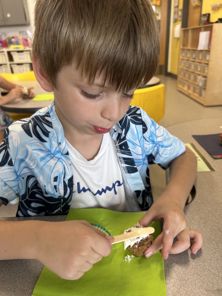 Kindergarten students had fun cleaning and chopping carrots, then tasted them two ways—dipped in ranch and baked into muffins they frosted themselves. Both were a hit!