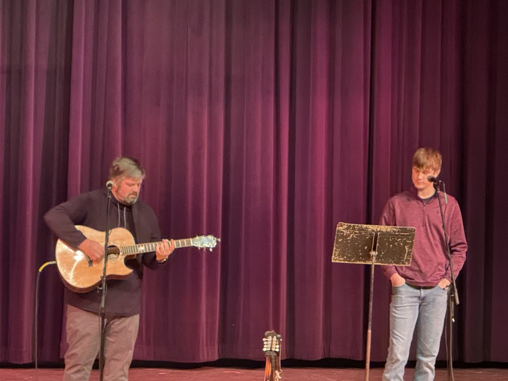 Community members attend the Harmony in the Heart of Community concert featuring singer Chris Kroeze. Student musicians Rowan and Gabe Koxlien and local performer Todd Barneson also perform, with proceeds benefiting Eleva-Strum students and community programs.