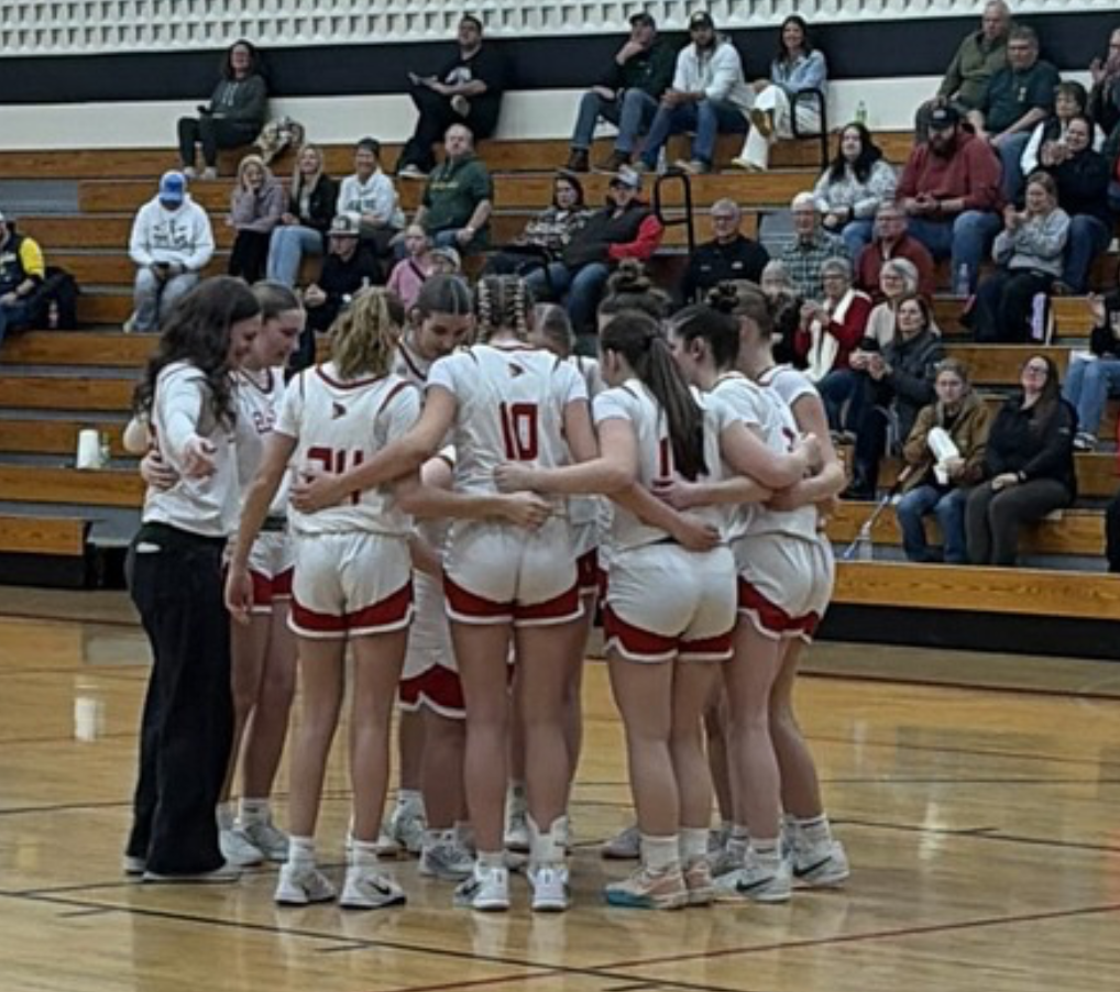 24–0. An undefeated regular season. But the most meaningful moment came when senior Clover made her debut, scoring six points as both teams and the crowd cheered her on.