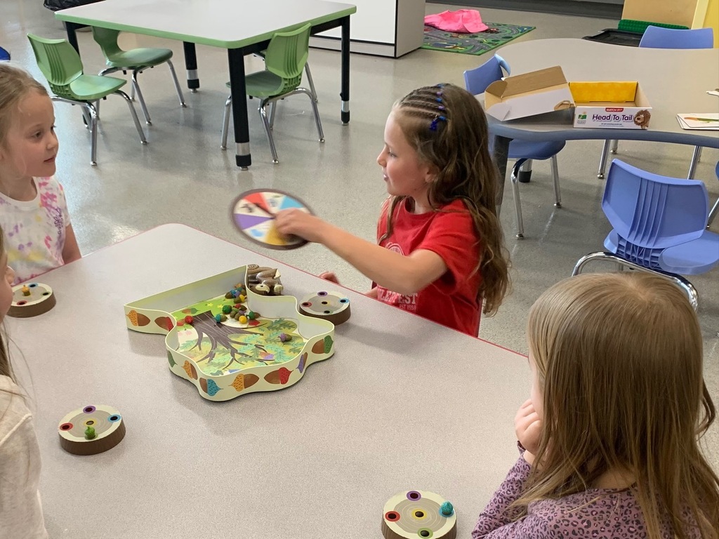 Students in grades 3–5 volunteered to play games with 4K friends, building social skills like turn-taking, teamwork, and following directions