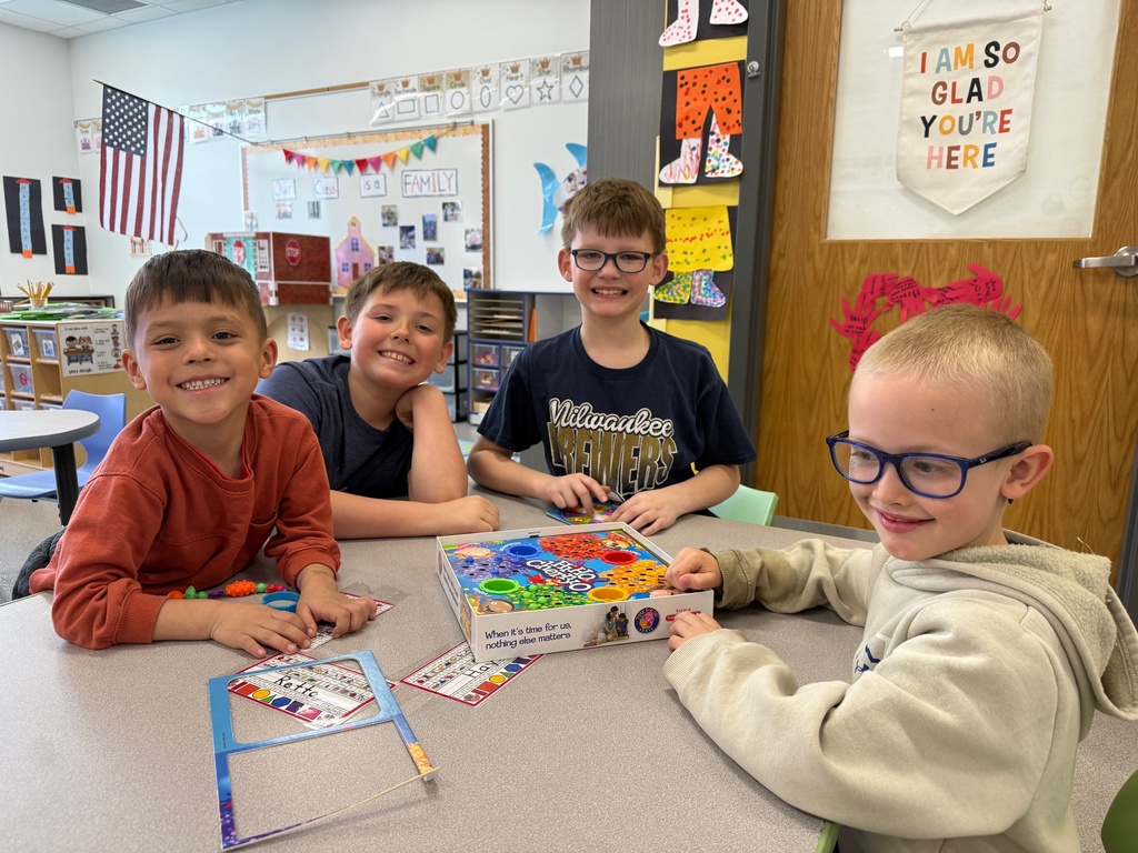Students in grades 3–5 volunteered to play games with 4K friends, building social skills like turn-taking, teamwork, and following directions