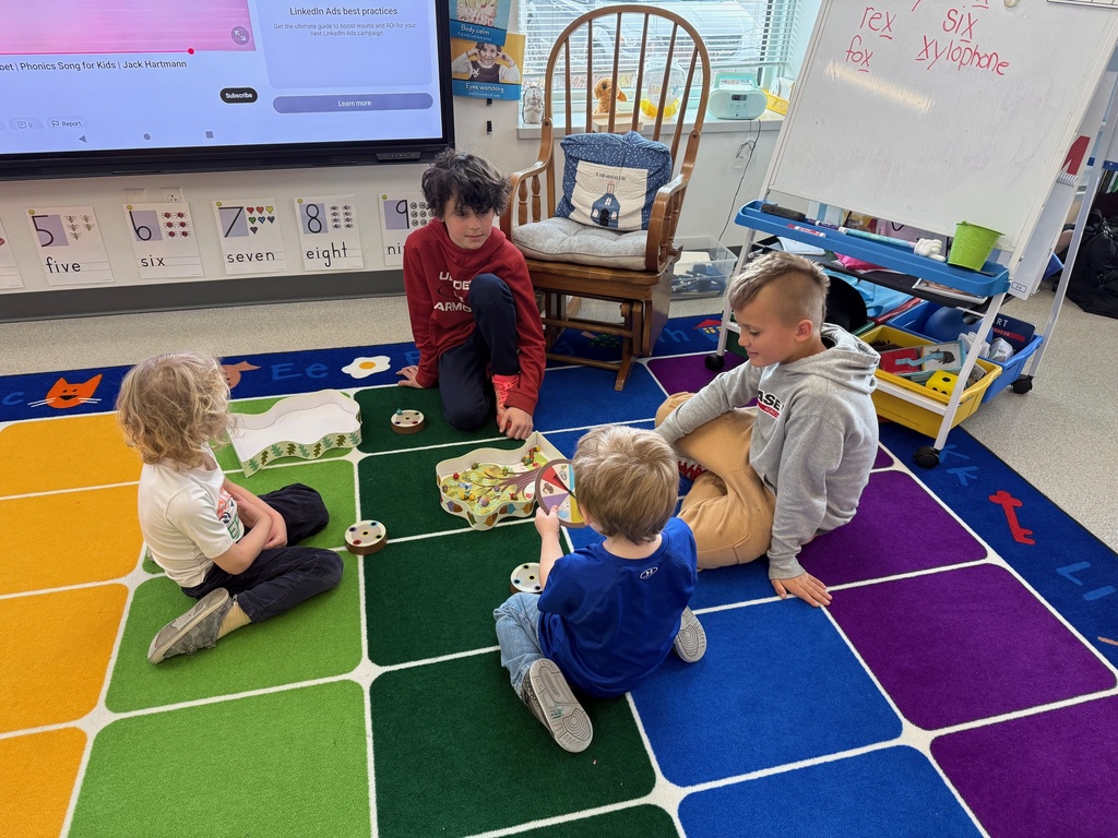 Students in grades 3–5 volunteered to play games with 4K friends, building social skills like turn-taking, teamwork, and following directions