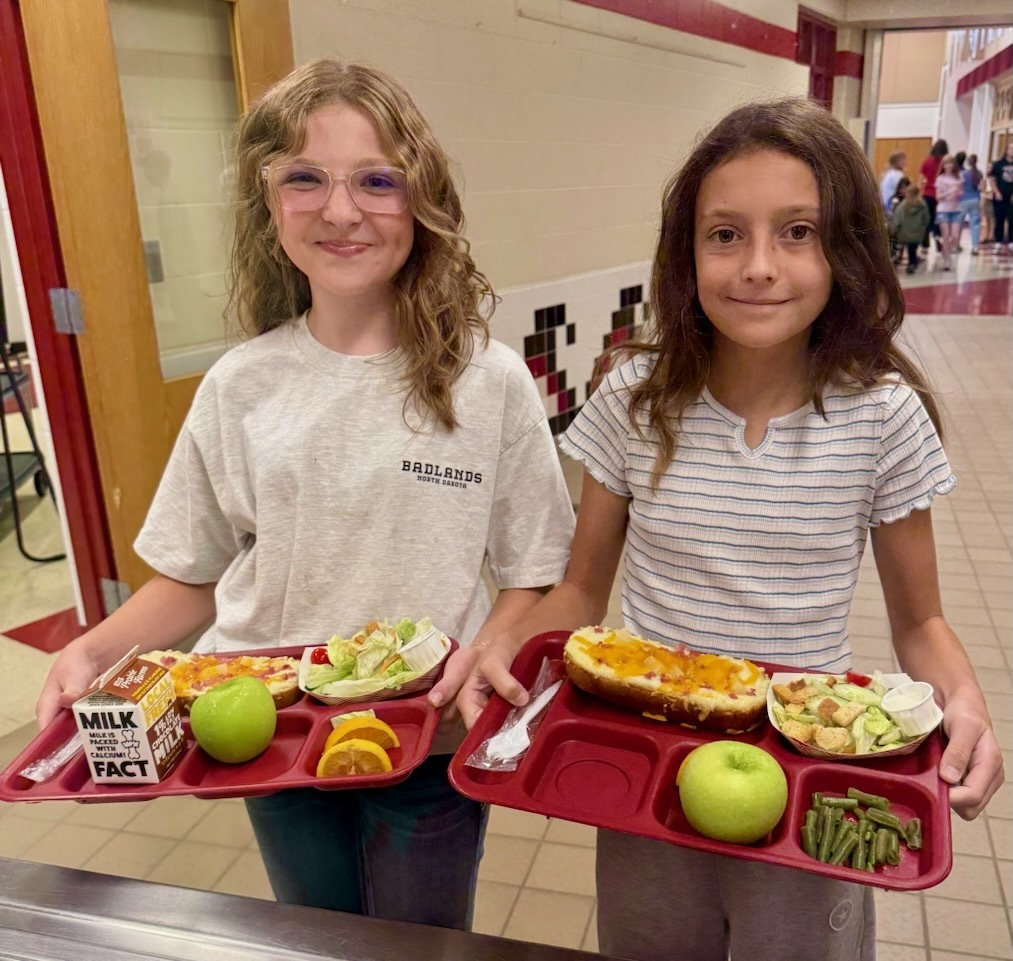 Students enjoyed Hawaiian French bread pizza with side salad, green beans, apples and milk.