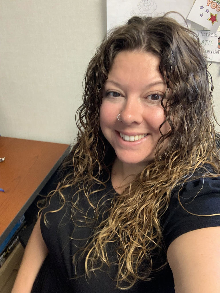 Cassandra McGowan in office chair