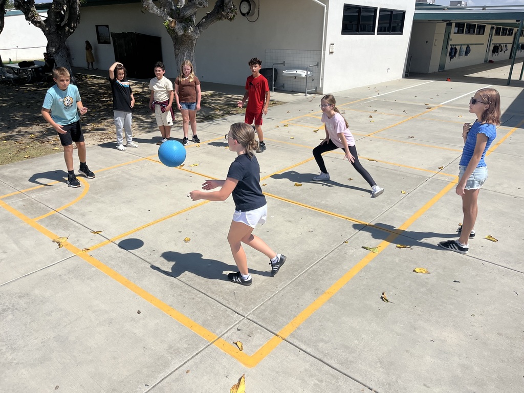 kids playing foursquare