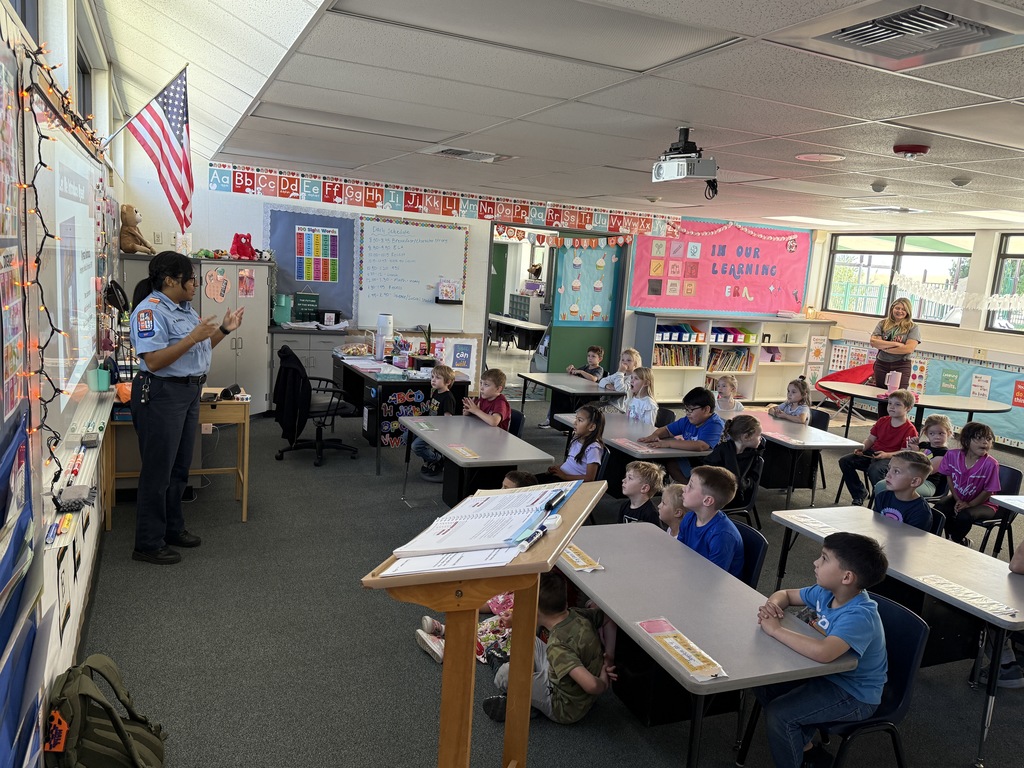 TK-1 students listen intently as Krystal Barboza from Hall Ambulance talks about the importance of school