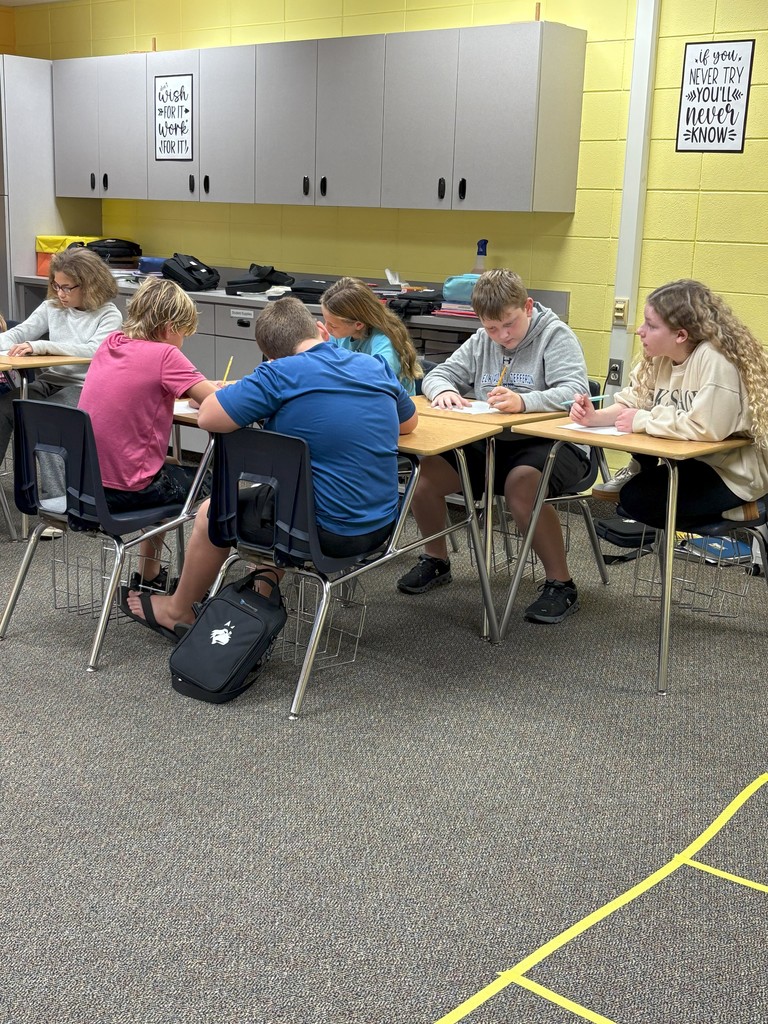 Team work on solving review problems.