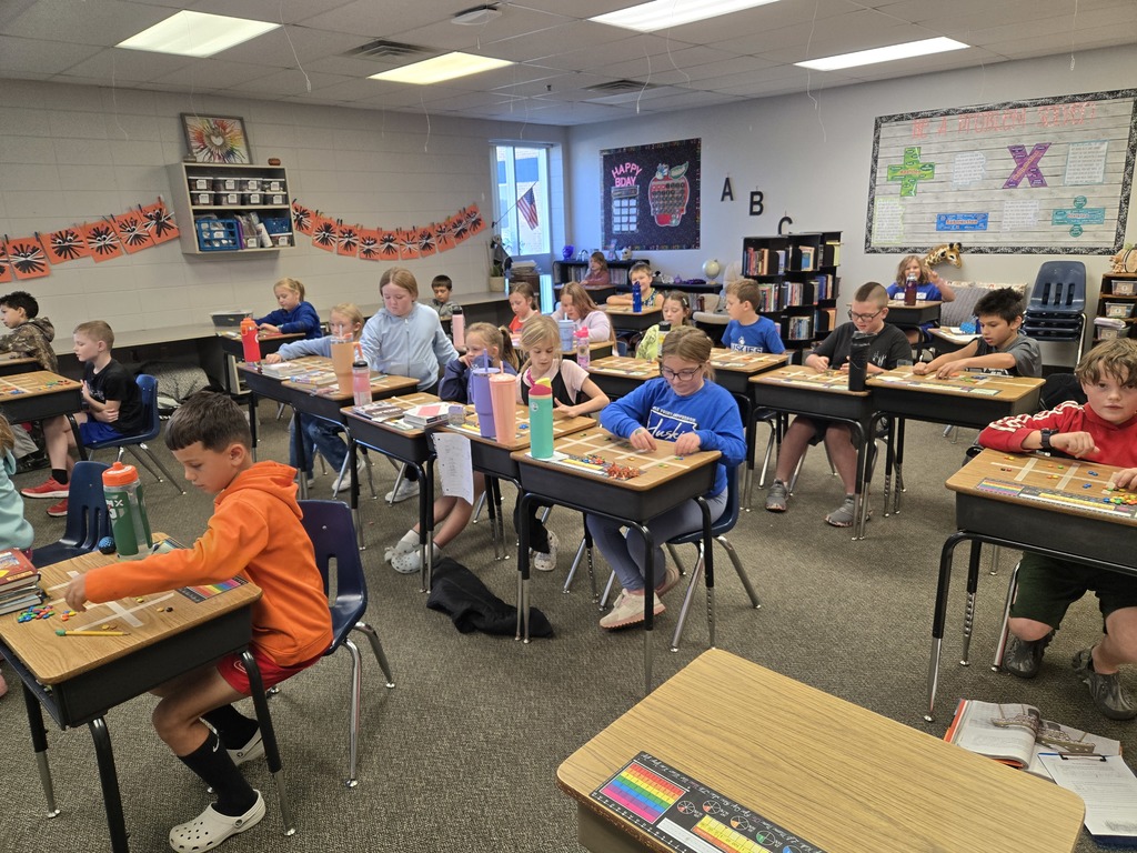 Students use M&Ms to multiply