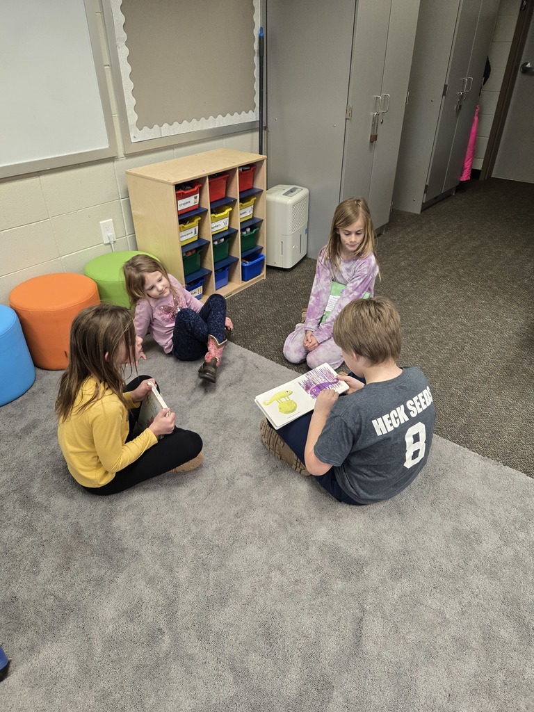3rd graders read to their preschool buddy