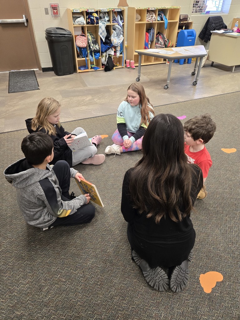 3rd graders read to their preschool buddy