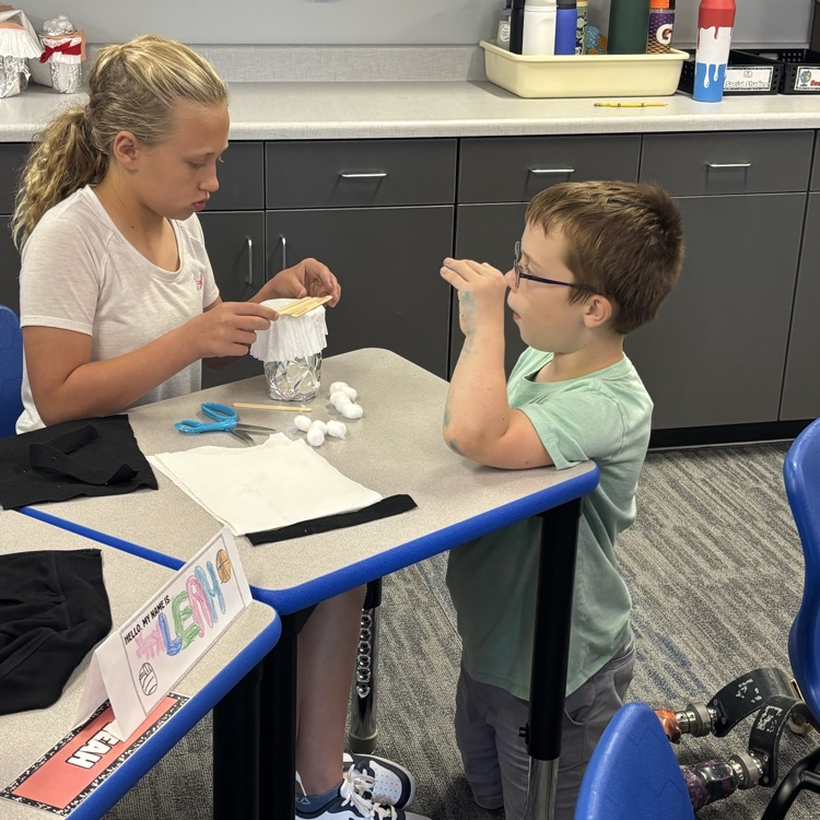 Students create their insulated containers.