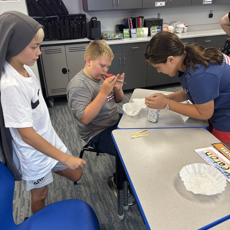      Students create their insulated containers.