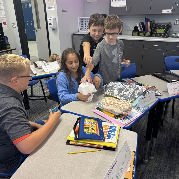                                Students create their insulated containers.