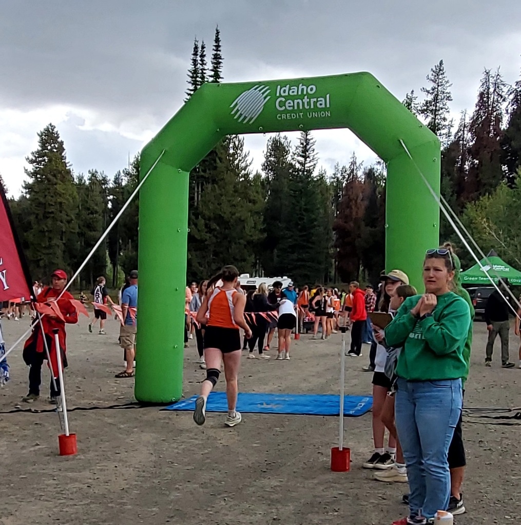 Wells High School cross country runners competing at Magic Mountain