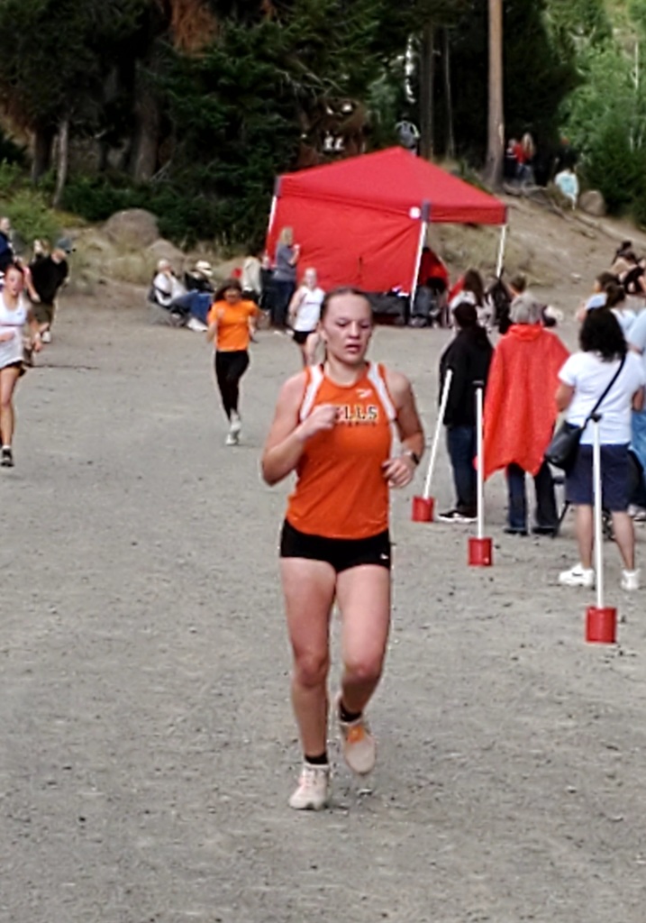 Wells High School cross country runners competing at Magic Mountain