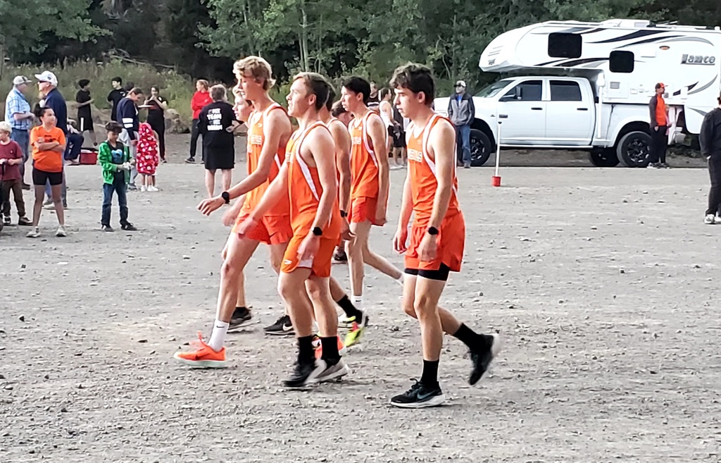 Wells High School cross country runners competing at Magic Mountain