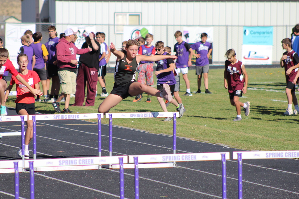 Wells jinior high athletes competing at their last track meet