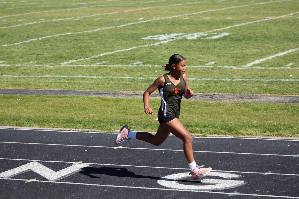 Wells jinior high athletes competing at their last track meet