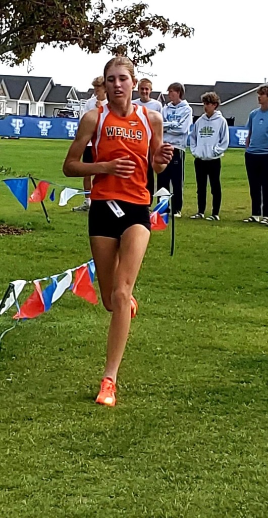 Millie C running at Dani Bates and setting a new school records for 5K