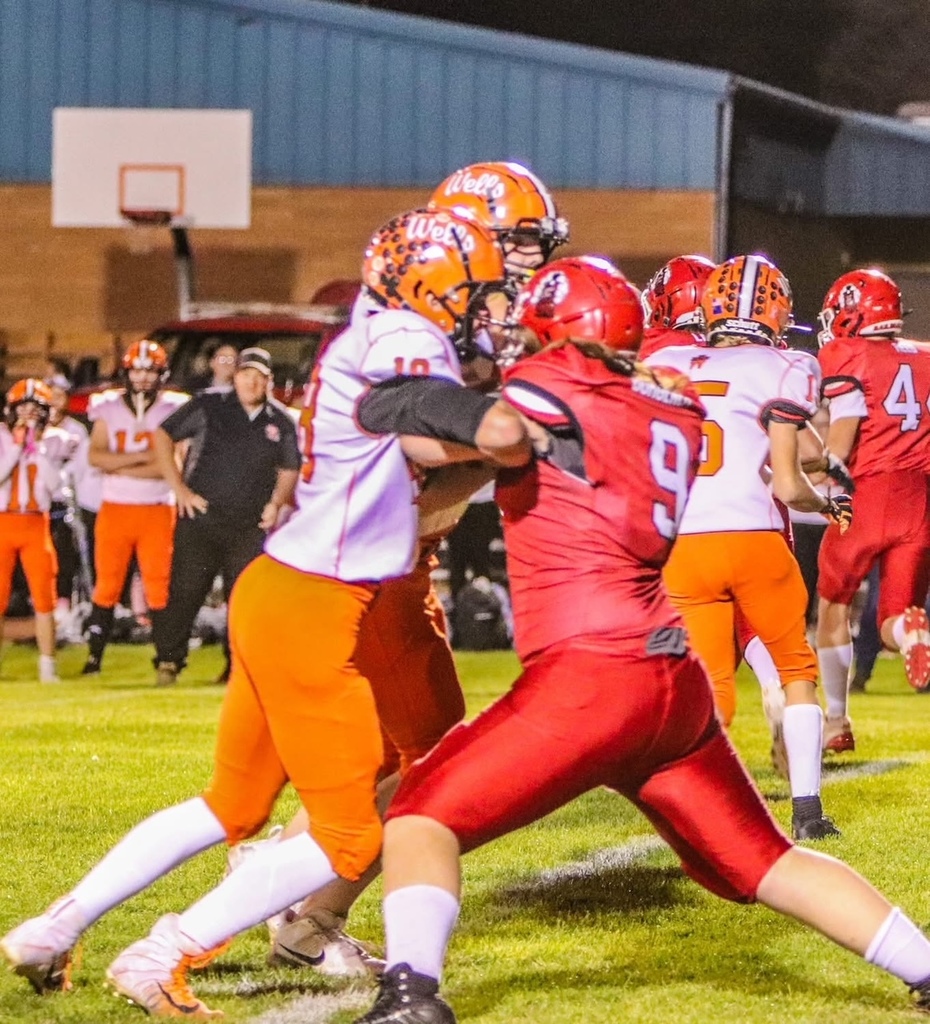 Wells High School football team vs Carlin
