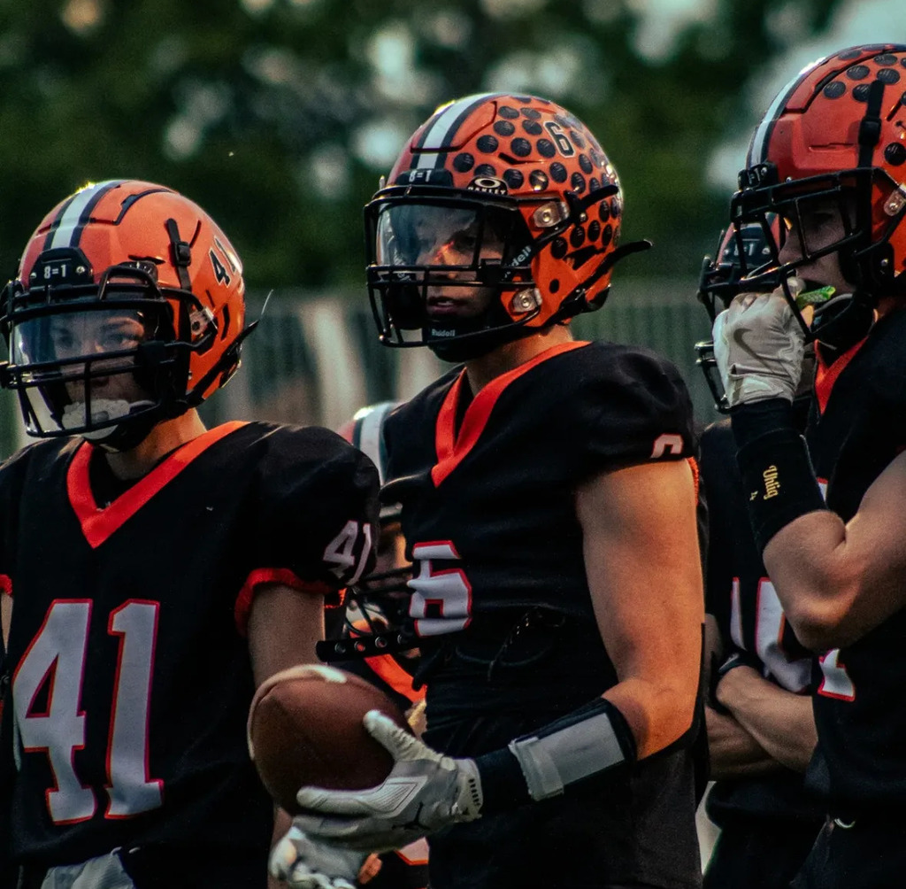 Joe D, Kade K . Wells High football players