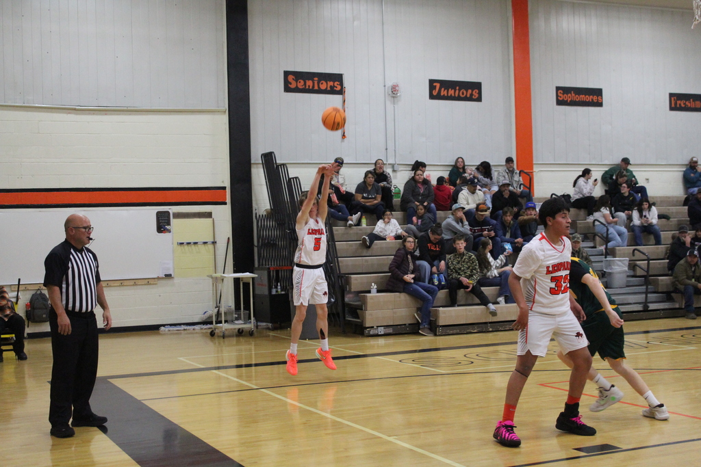 Wells JV basketball team playing Battle Mountain