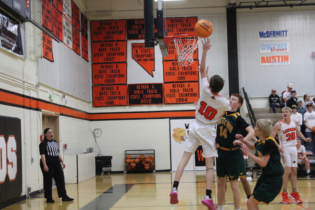 Wells JV basketball team playing Battle Mountain